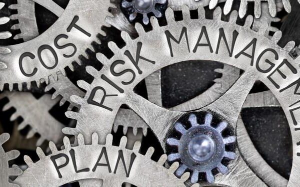 Macro,Photo,Of,Tooth,Wheel,Mechanism,With,Risk,Management,Concept